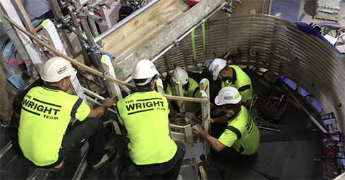 The Wright Team steaming and fitting the sections of timber staircase